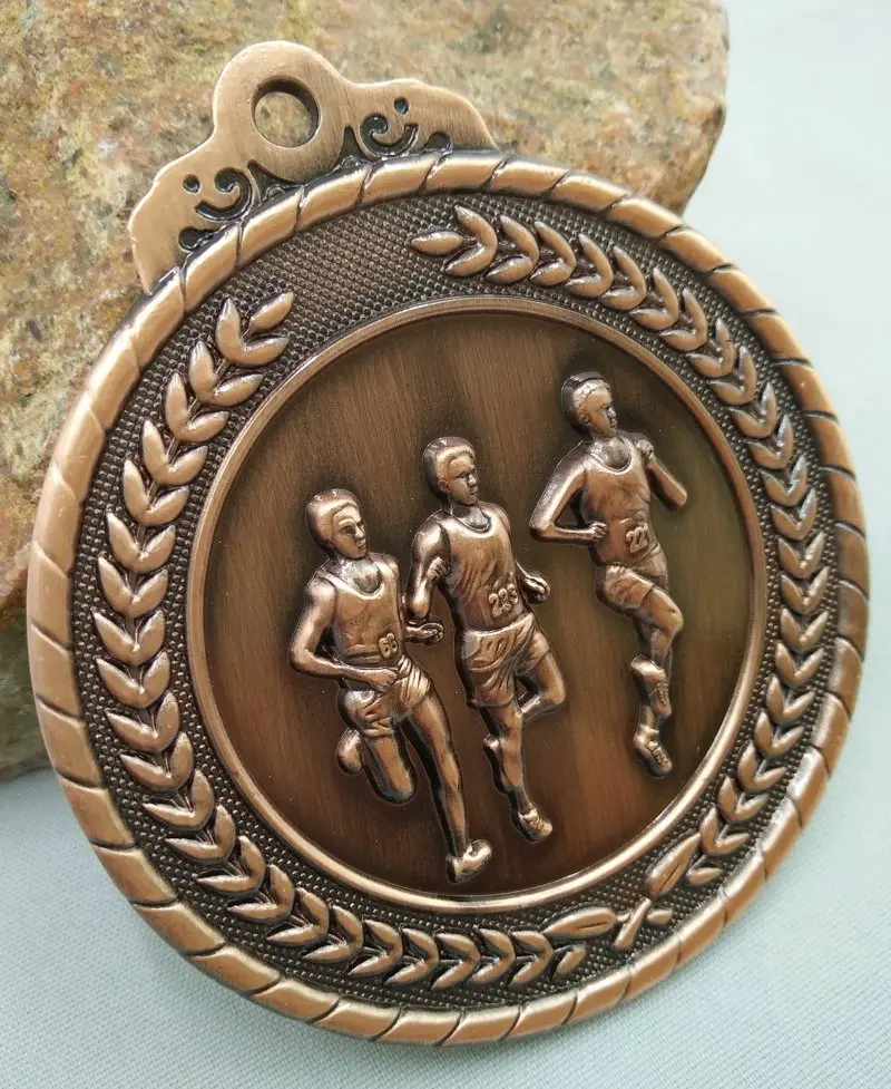 Médaille de sport, d'athlétisme, de course à pied, de Bronze, d'or, d'argent, de Communication, de confiance en soi, de développement de la gymnastique