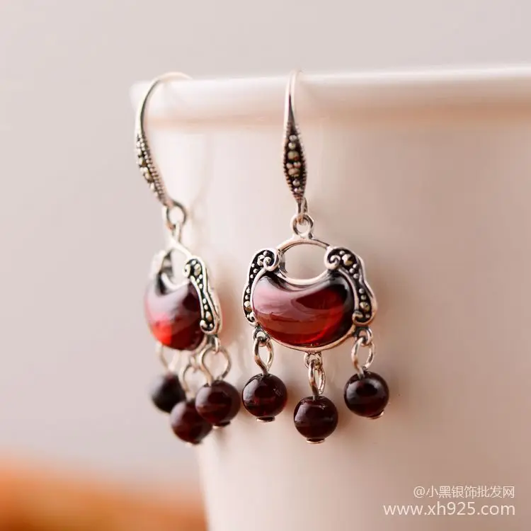 KJJEAXCMY fine jewelry S925 Pure silver jewelry  pomegranate stone lock style national style court tassel earrings