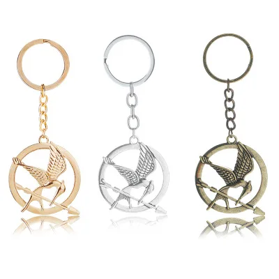 The Hunger Games Keychain Popular Vintage Style Birds Charm Golden Snitch Pendent Key Chain Keyrings Metal Keychains Car Holder