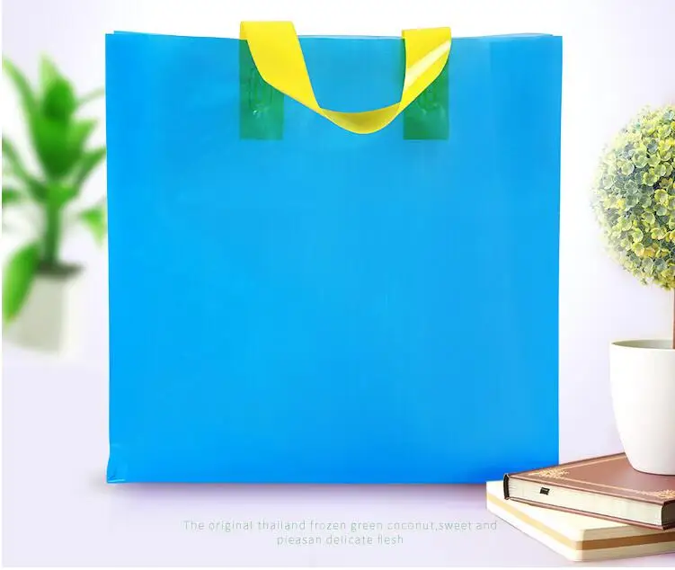 100pcs/lot Large Plastic Shopping Bags with Handle Festival Gift Bag Clothes Store Packing Bag Wholesale