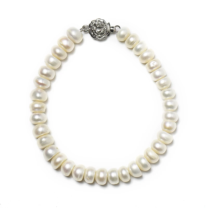 A flat ellipse  Same Sizes  with  Smooth  Light  Yellow  and Unique Design 5*7 mm  Freshwater  Natural pearl Bracelet