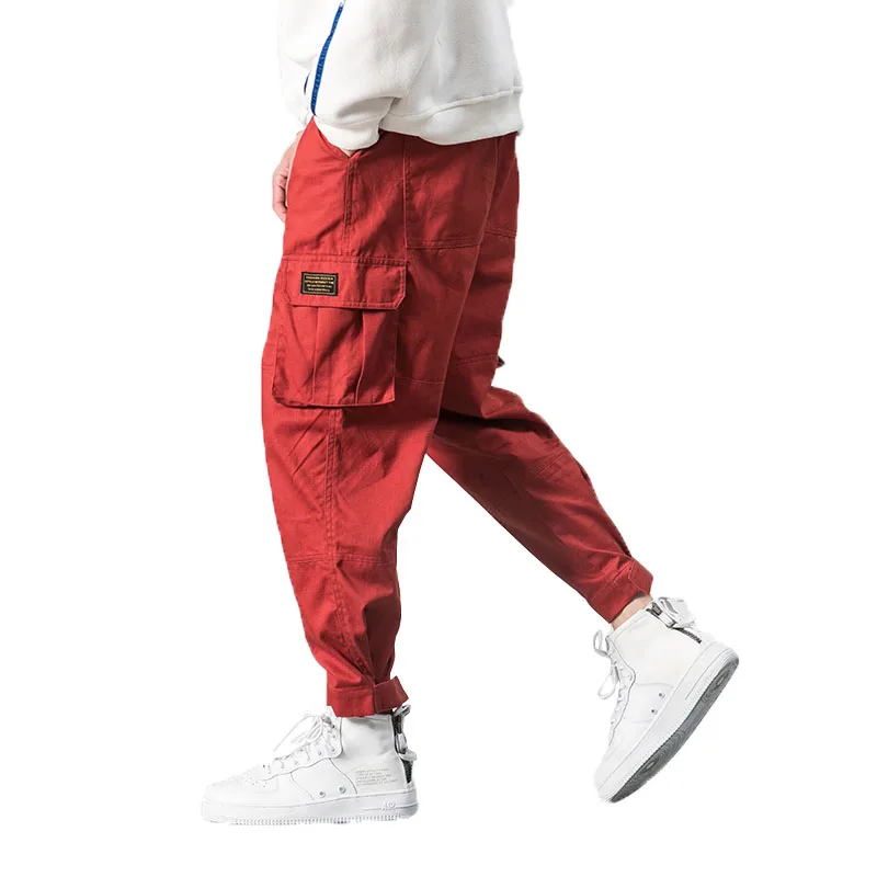 

2022 Men Multi-pocket Elastic Waist Design Harem Pant Street Punk Hip Hop Red Casual Trousers Joggers Male Army Cargo Pants 5XL