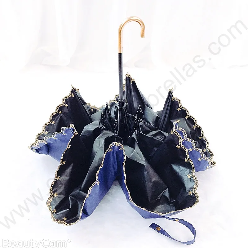 Three fold manual 210T pongee black coating strong anti-uv 50+ umbrella fiberglass embroidery golden windproof parasol