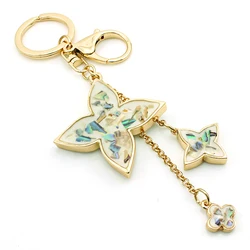 JINGLANG Fashion Gold Color Metal Lobster Clasp Keyrings Clover Charms Keychain For Women Handbag Luxury Jewelry