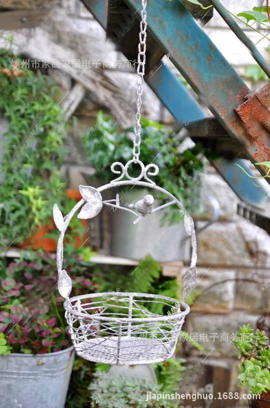 

French country garden decorative wrought iron bird to do the old vintage hollow flower baskets hanging