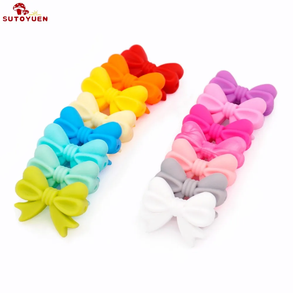 SUTOYUEN 50PCS Bow Tie Silicone Beads Baby Pendants Food Grade Silicone DIY Teething Necklace Jewelry Making Cartoon Bowknot Bea