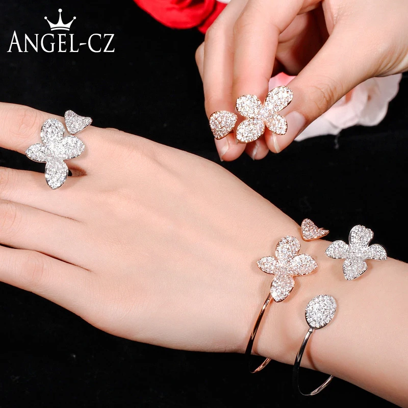 ANGELCZ แฟชั่น Cubic Zirconia เรขาคณิตดอกไม้เปิด Rose Golden กําไลข้อมือแหวนแบรนด์หรูชุดเครื่องประดับสําหรับผู้หญิง AJ177