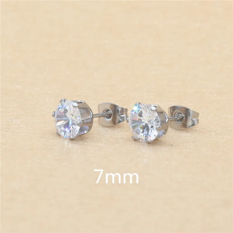 Klassische Ohrstecker aus Edelstahl, weiß, mit AAA-runden weißen Zirkonia-Steinen, 3 mm. – Detail 19