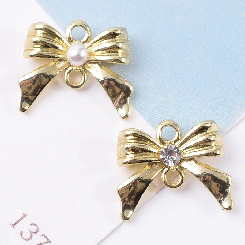 

50pc 15*17mm Gold color New fashion Alloy Material Crystal/Pearl Bow Shape charm for DIY Handmade Jewelry Making wholesale
