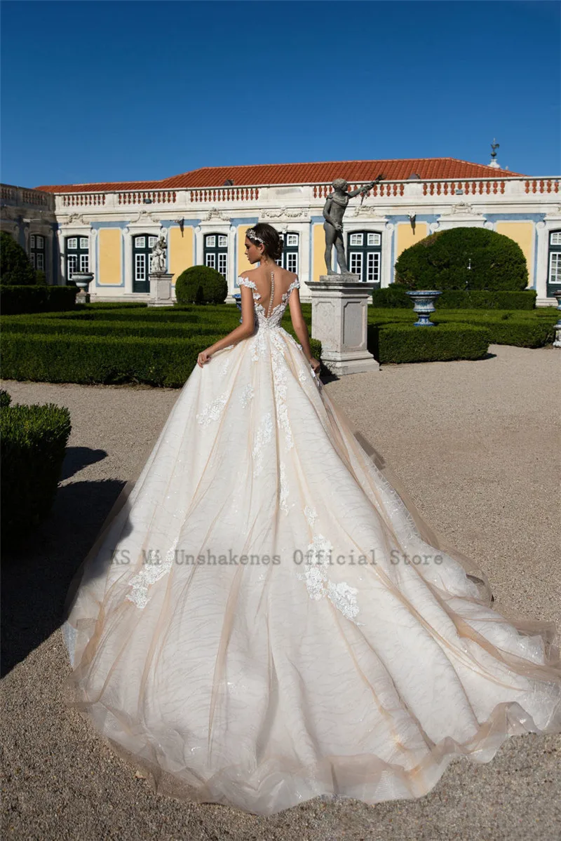 Robe de Mariage abito da ballo Champagne abito da sposa 2021 abiti da sposa in pizzo treno lungo chiesa Chic abiti da sposa manica a cappuccio