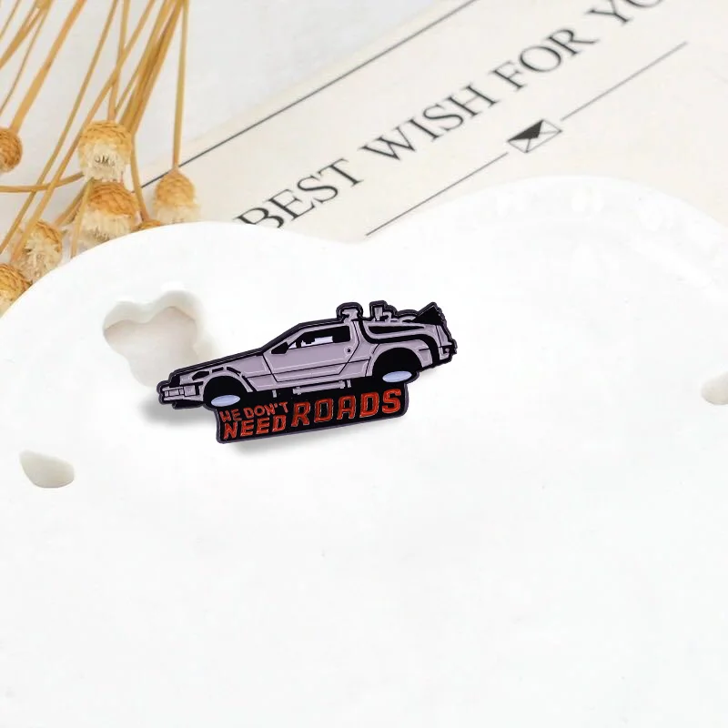 We don\'t need roads Back to the Future TimeTravel car enamel lapel pin Retro 80s Movie Marty McFly Time machine DeLorean brooch