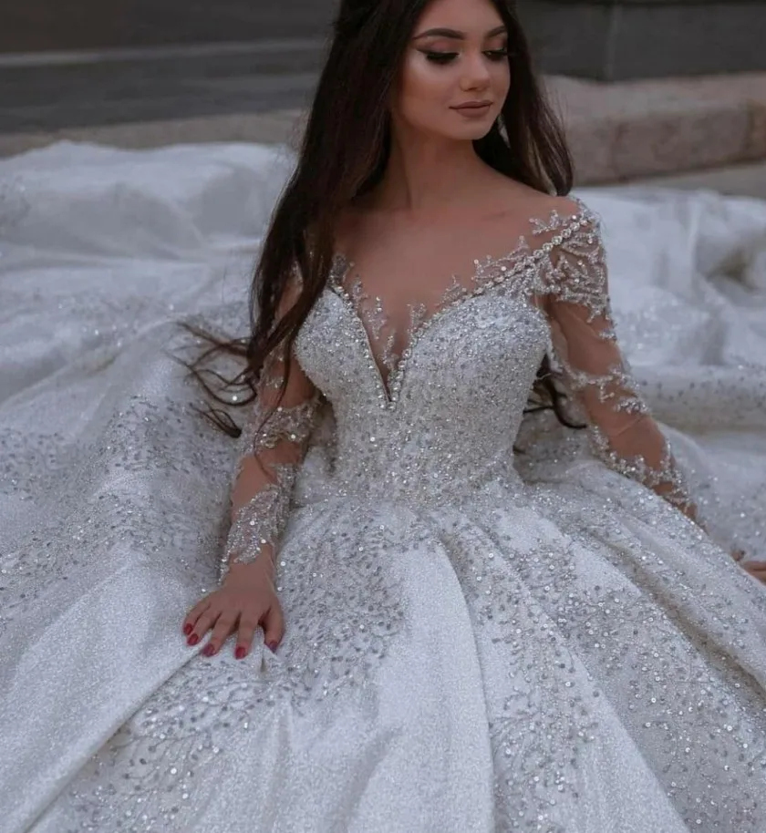 

2024 New Crystals Arabic Dubai Wedding Dresses Gorgeous V Neck Lace Long Illusion Sleeve Bridal Gowns Vestidos De Noiva