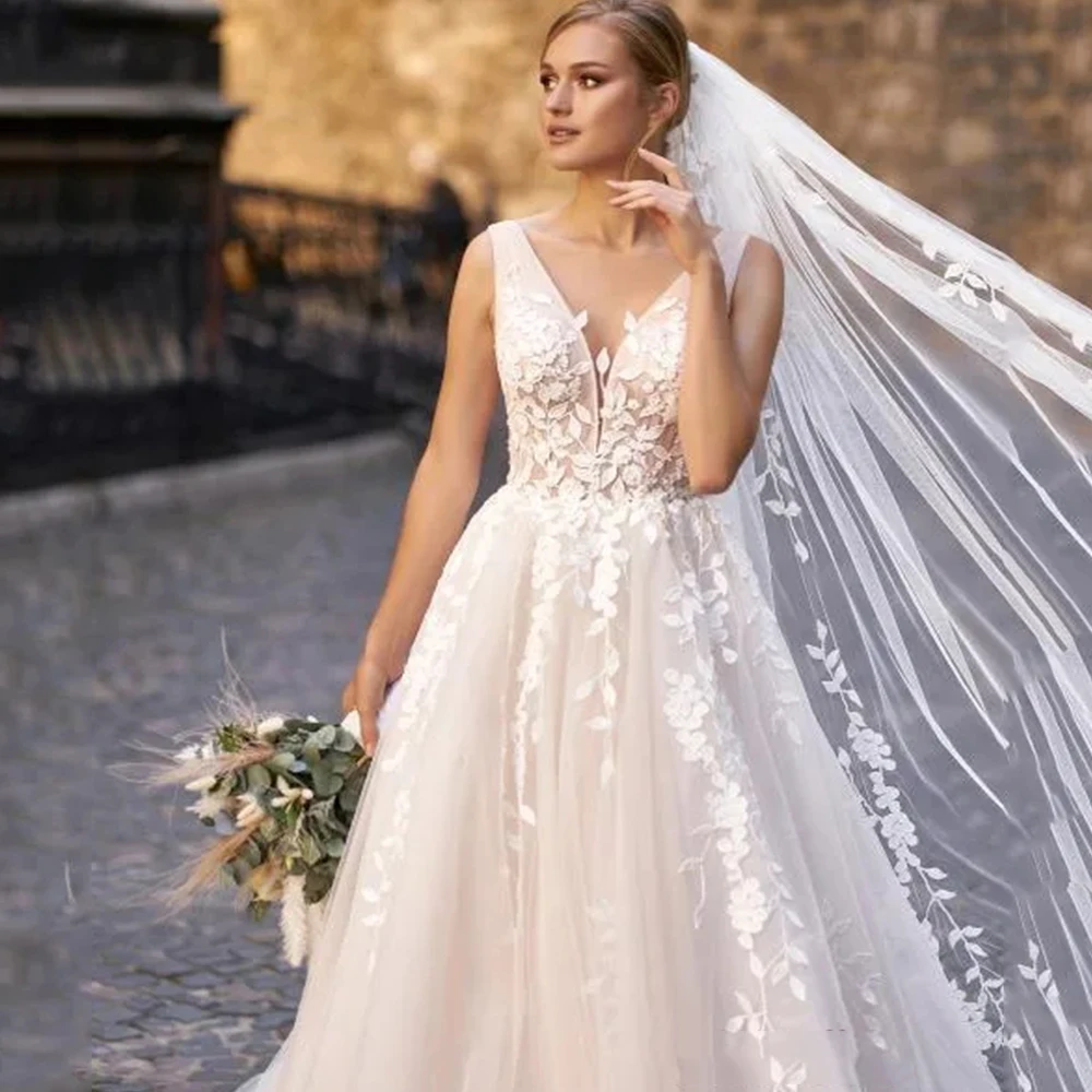 Suknie ślubne księżniczki Eleganckie koronkowe aplikacje z dekoltem w szpic, bez rękawów, tiulowe, z odkrytymi plecami, dostosowane suknie ślubne Robe De Mariée