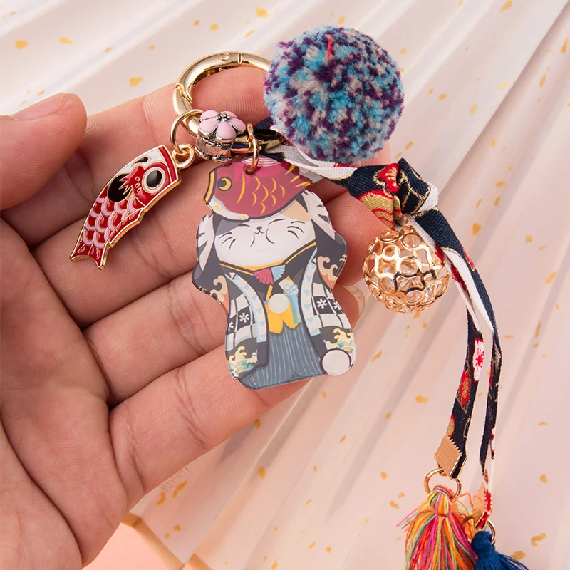 Pendentif porte-clés chat porte-bonheur, dragonne créative, voiture, sac d'école féminin mignon, ornements d'anneau, lanière de clé de couple de dessin animé, accessoires