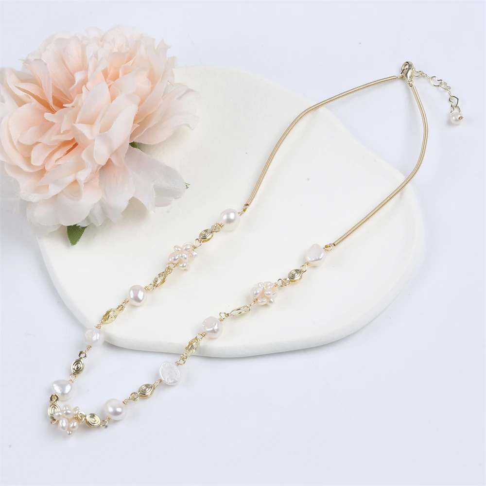 

Natural White 6-7mm Baroque pearl and 8mm Freshwater Pearl Ball Necklace