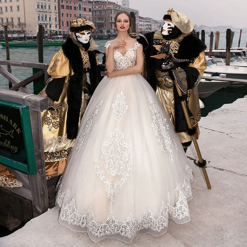 Vestidos de casamento modernos personalizados 2023 uma linha ilusão colher apliques tule vestido de noiva com manga boné e tribunal trem robe de