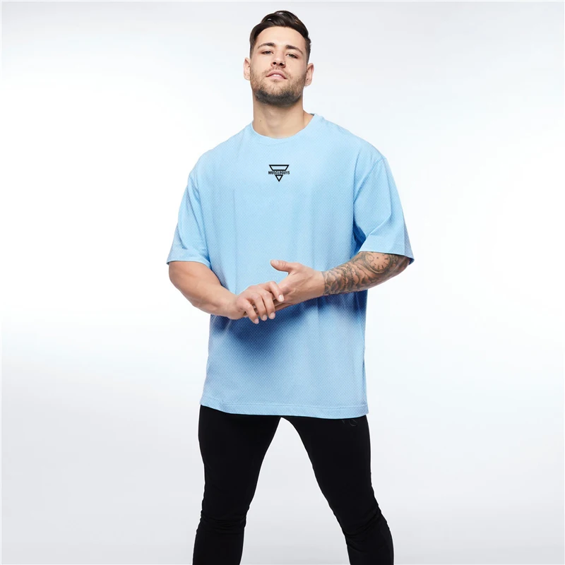 Mens Gym Fitness Clothing Comfortable Oversize Short Sleeve Fashion Shirts Brand Mesh Casual Bodybuilding Tights Sports Tshirt