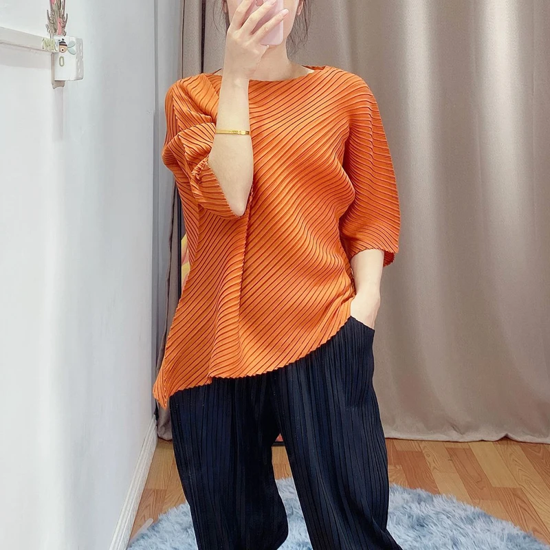 

Summer 2020 thin Word collar Women's T-shirt Miyak fold Fashion irregular design Solid color loose and thin 7 sleeves top Tied