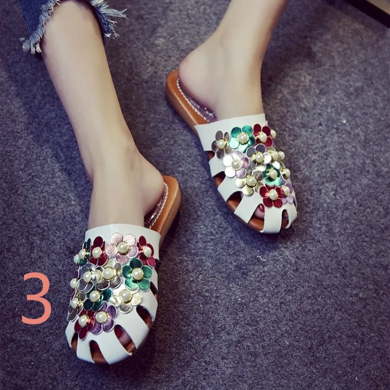 WUYAZQI Summer new  fashion pearl hollow flower  flat bottom sandals and slippers female Baotou  tide wholesale women\'s shoes