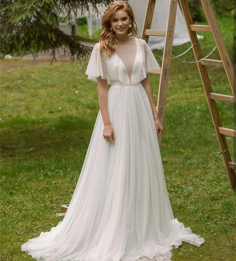 Abito da sposa bohémien a pois A-Line O-Collo Manica corta Perline di pizzo Perle Bottoni Lunghezza pavimento Abito da sposa con strascico Personalizzato