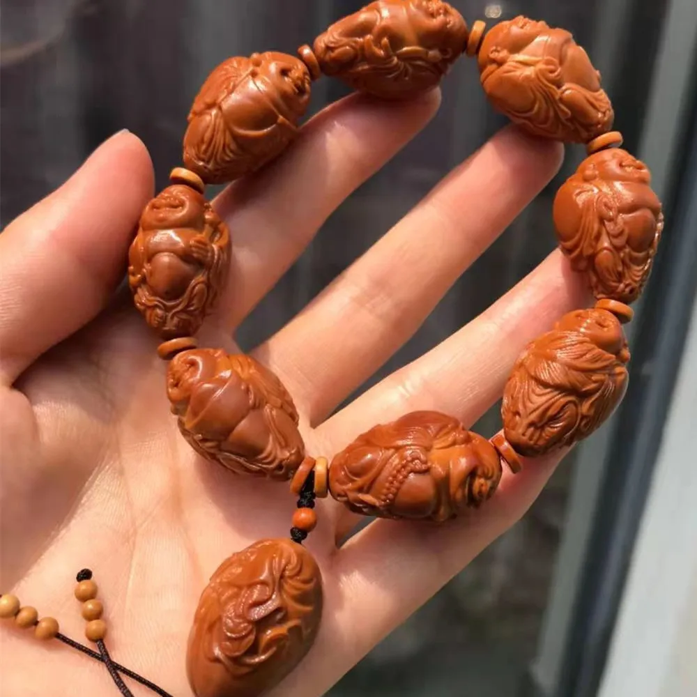 

Wenwan Olive Pit Carving Smile Mouth Often Open Bracelet Old Red Oil Pit Carving Bracelet Olive Pit Hu Jing Carving Play