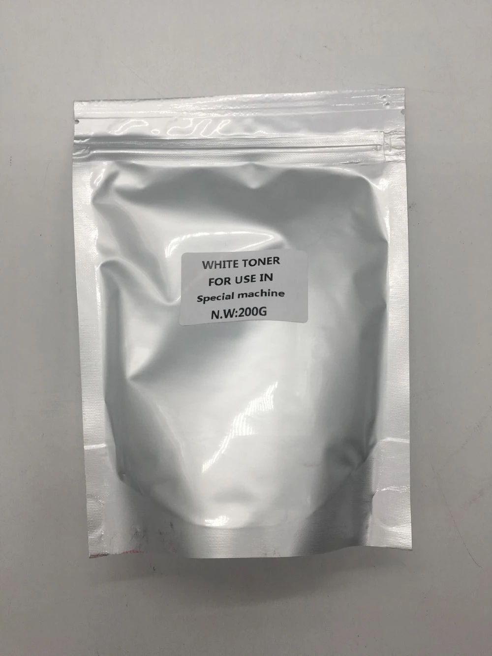 

JIANYINGCHEN compatible White toner powder 200g for Special print machine with aluminum foil bag