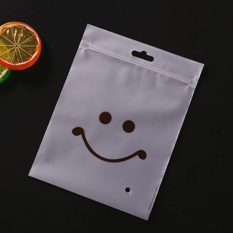 

100pcs EVA Frosted Smiley Face Packaging Bone Bag Clothing Zipper Bag Plastic Bag Custom Printed Saliva Towel Bib Bag