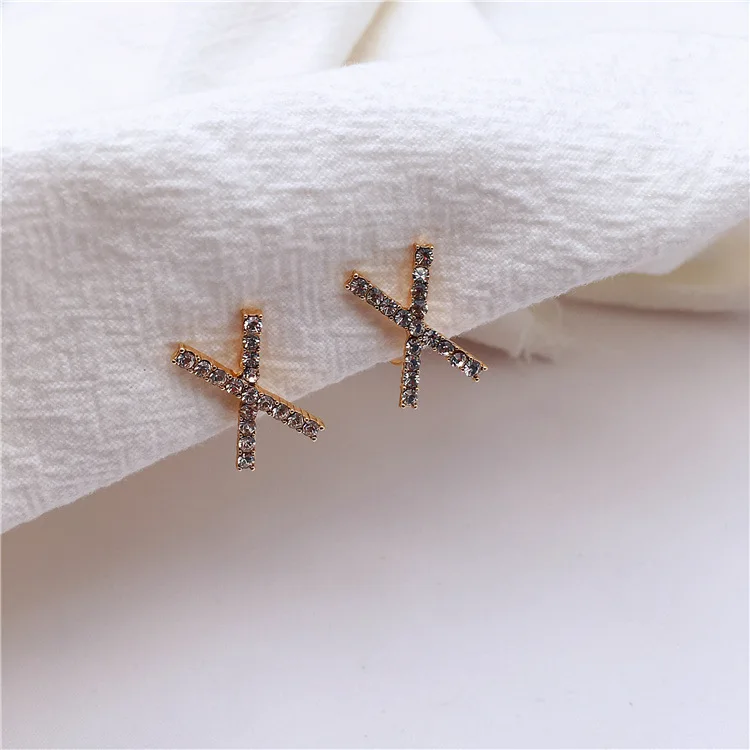 

Ear clip minimalist temperament cross-set diamond earrings no ear hole cold wind slightly set X letter earring earrings