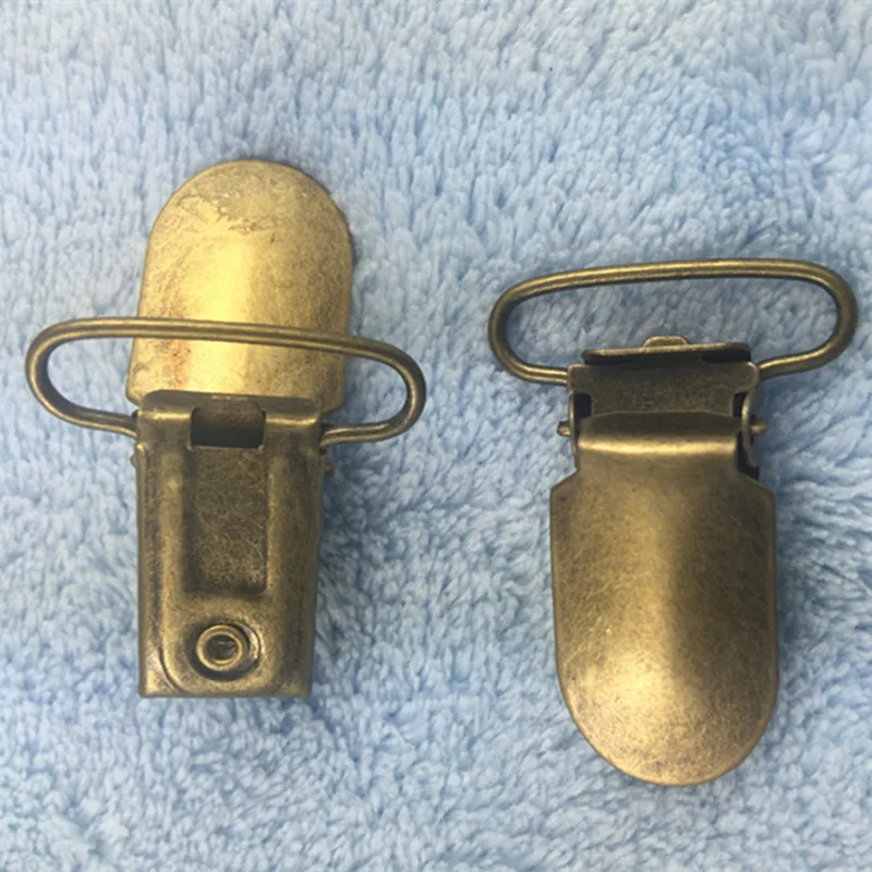 50ピース/ロット25ミリメートル1''antiqueブロンズ太平洋おしゃぶりメタルサスペンダークリップ縫製ツールフックホルダープラスチック挿入diy