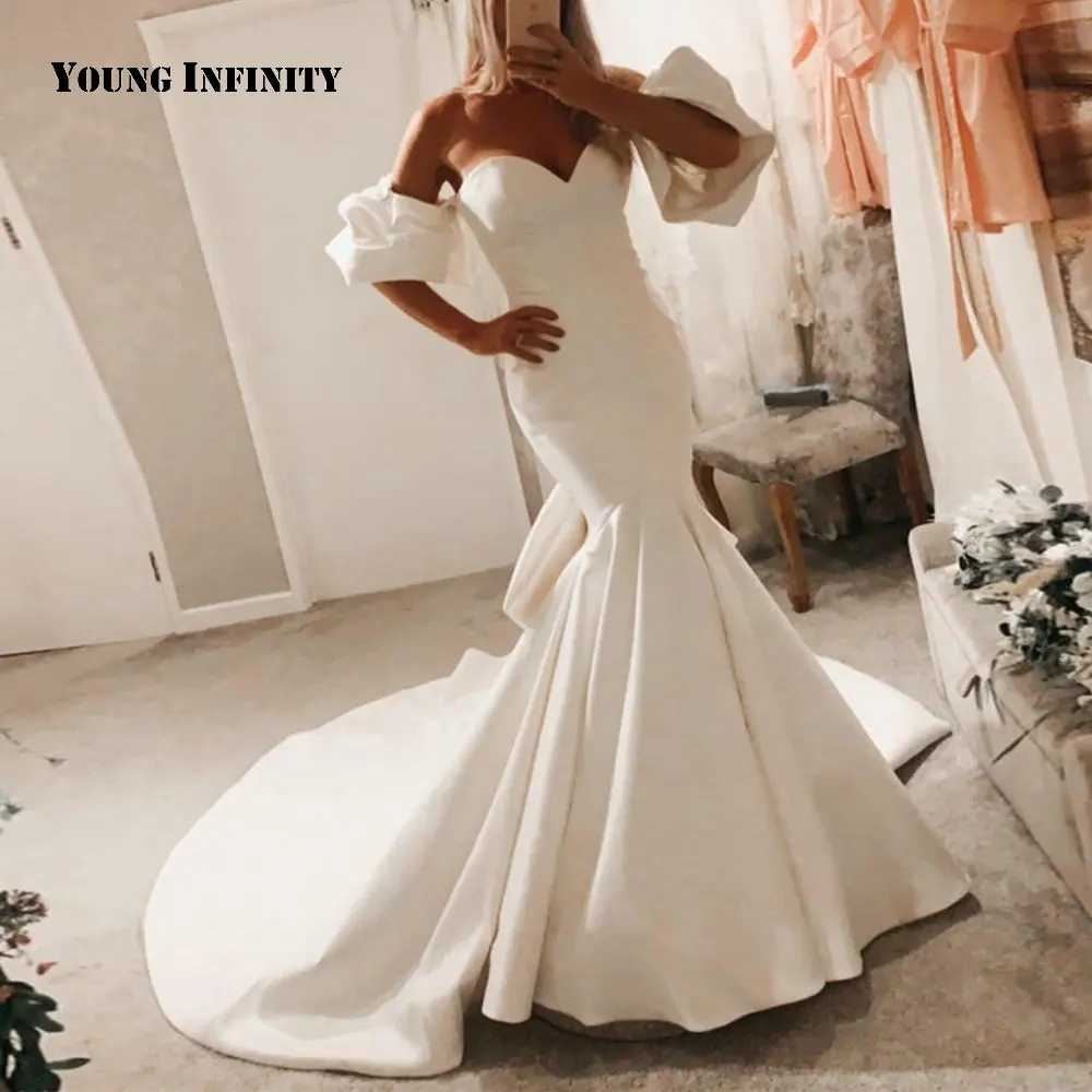 New Arrival Sweetheart Wedding Dress 2021 Satin Puff Sleeve Button Bow Court Train Floor Length Backless Mermaid Bridal Gown