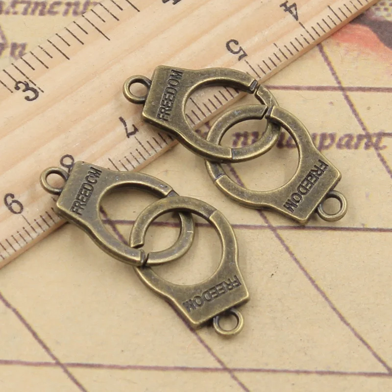 10pcs Charms Handcuffs Freedom 23x15mm Tibetan Bronze Silver Color Pendants Crafts Making Findings Antique Jewelry DIY Necklace