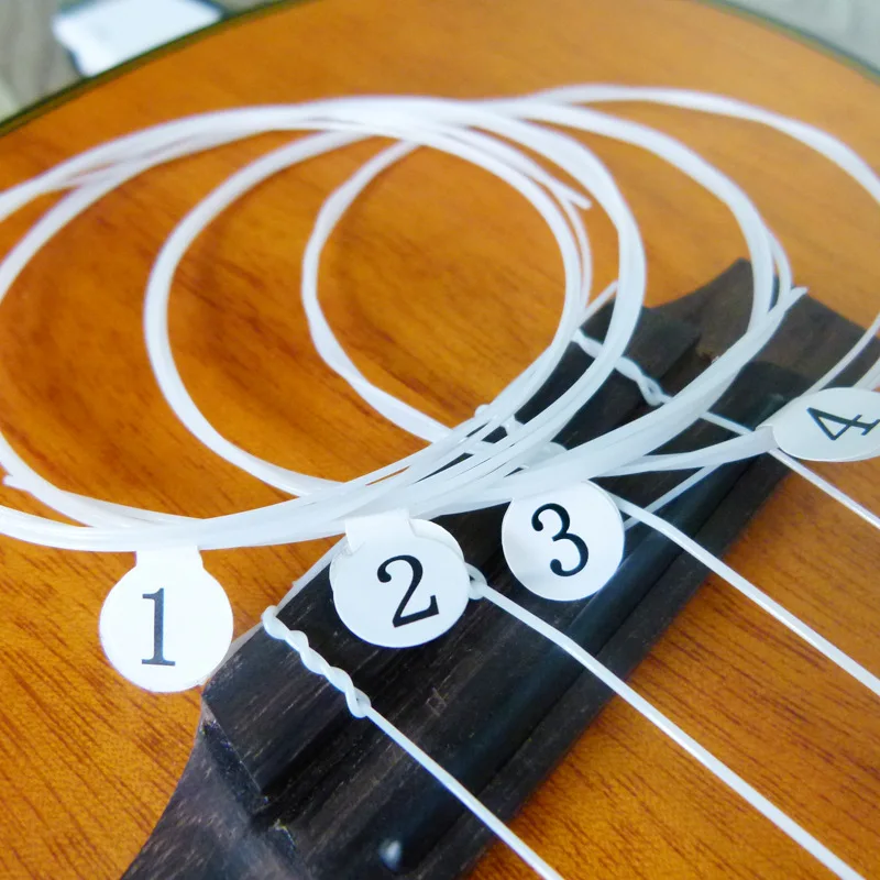 Original Aquila Ukulele Saiten Nylon Sopran Konzert Tenor Ukulele Saiten Low G Nylgut Saiten Für Ukulele Musikinstrumente – Detail 7