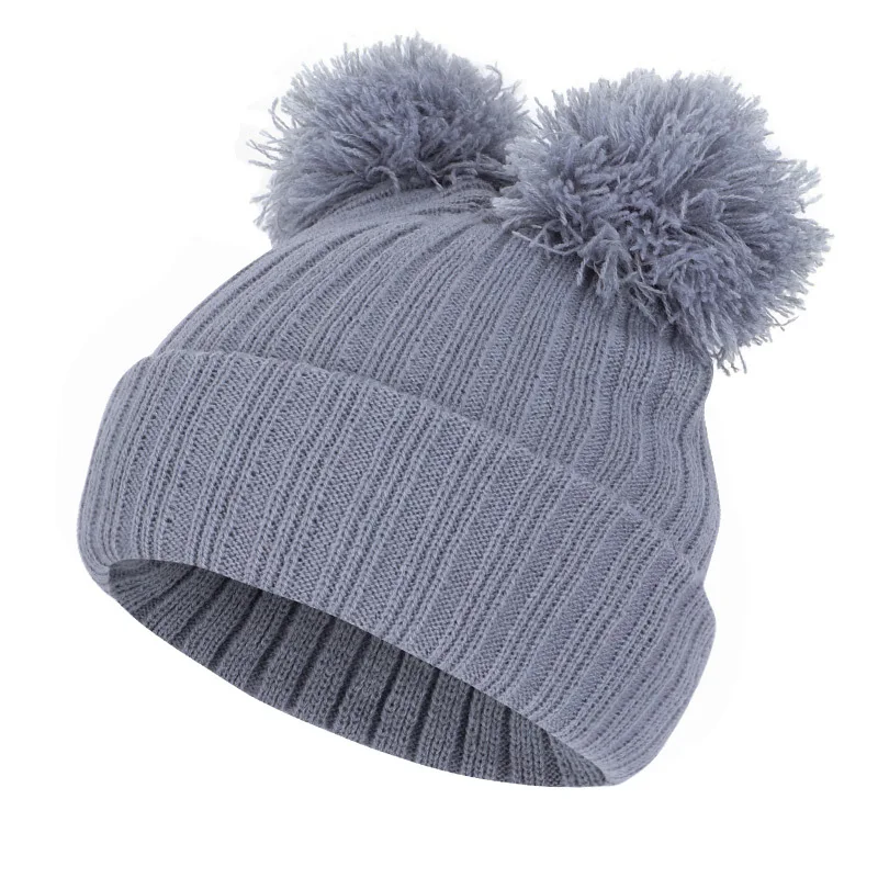 Autumn and winter new children 1-9 years old bow knot double wool ball cute sweet woolen hat warm knitted hat 1-9 years old