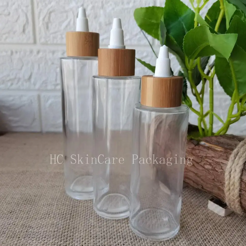 Empty Custom Logo Cosmetic Containers Packaging Clear Glass Bottles Jar with Bamboo Glue Lid Shampoo Lotion Toner Spray Bottles