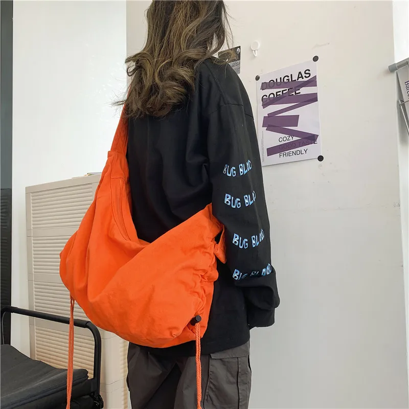 Tide online-Bolso de lona plegable de gran capacidad para mujer, bandolera de hombro con cuerda para estudiantes, novedad de 2023