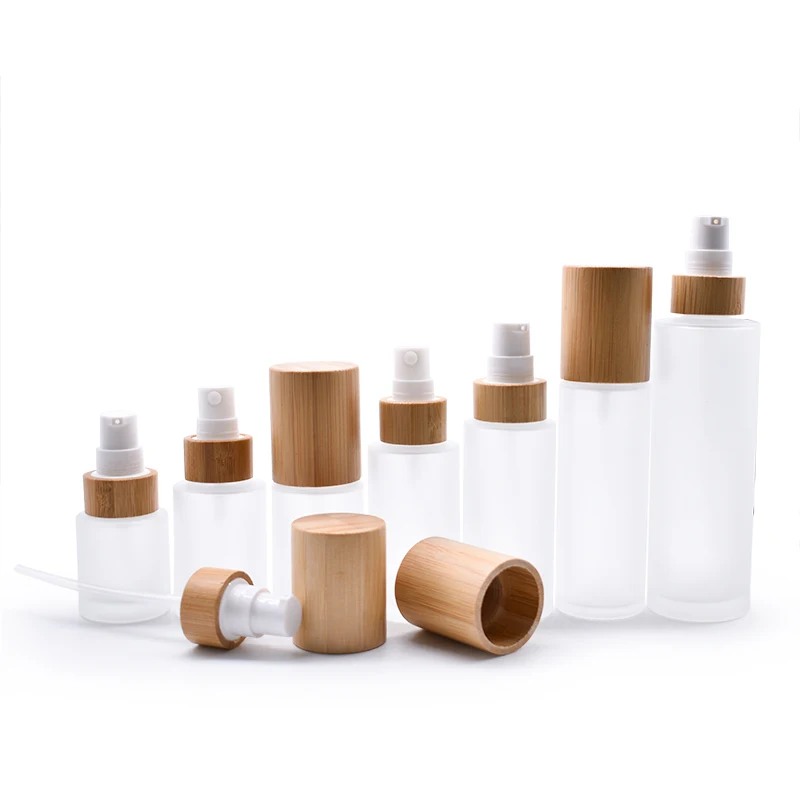 

Natural New Developed Wooden Bamboo Cap Round Frosted Glass Bottle with Lotion Pump Spray 120ml Frosted Glass Spray Bottles 4oz