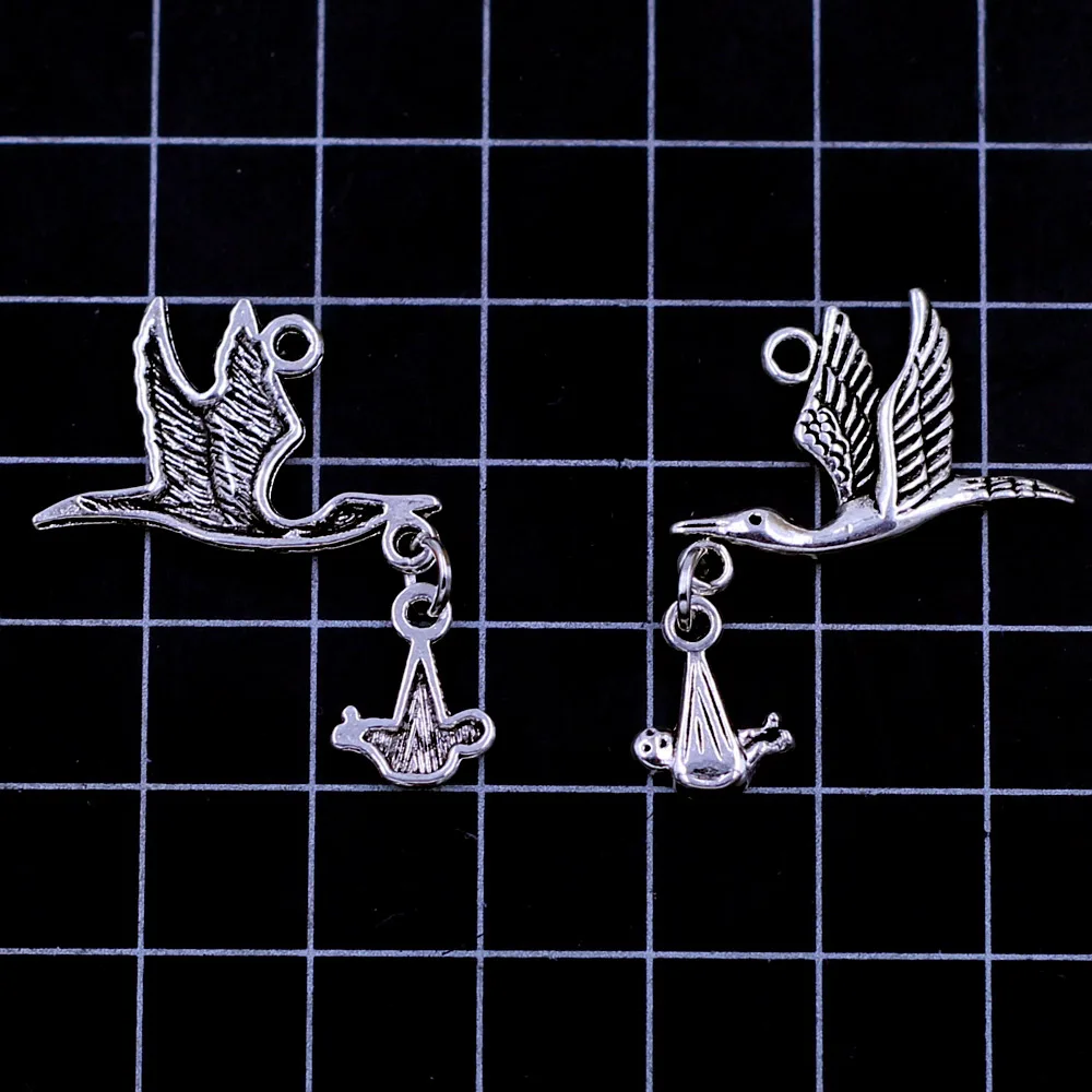 10Pcs Pendants Flying Stork Bird With Dangling Baby Silver Tone Jewelry DIY Findings Charms 17mm