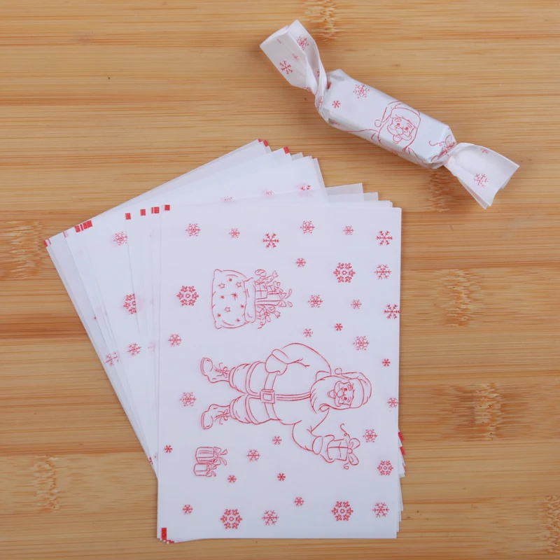 AQ 500 unids/lote estilo Simple línea roja Santa Claus que cae nieve fiesta de Navidad tortuga de azúcar papel para envolver postre paquete de regalo papel