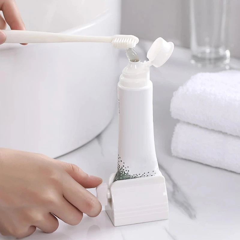 WIKHOSTAR Bathroom Accessories Rolling Toothpaste Squeezer Multifunctional Toothpaste Dispenser Facial Cleanser Tube Squeezer