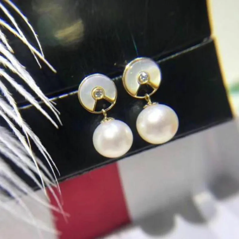 gorgeous pair of 10-11mm south sea round white pearl earring 18k