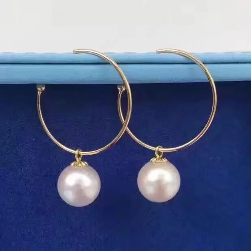 charming pair of 10-11mm round south sea white pearl earring yellow gold