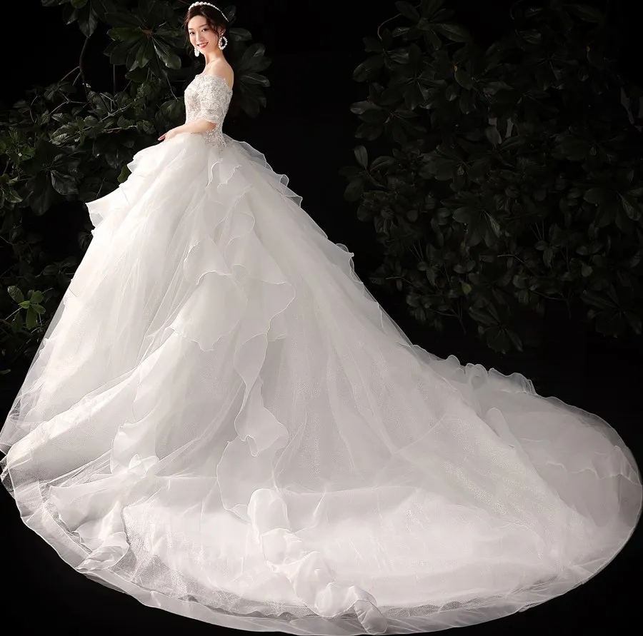 Abito da sposa di lusso fatto a mano elegante scollo a barchetta mezza manica abito da ballo pizzo fiore perline Vestido De Noiva Plus Size su misura