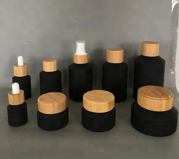 

60ML 100ml black matte glass cream jar lotion spray pump bottle with luxury bamboo lid wood cap Cosmetic container face mask jar