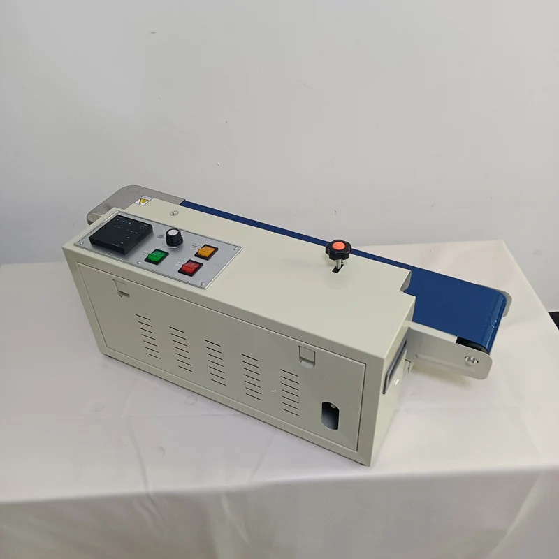 حار بيع آلة الختم المستمر للأكياس البلاستيكية مع آلة ختم الأكياس فيلم الحزام الناقل