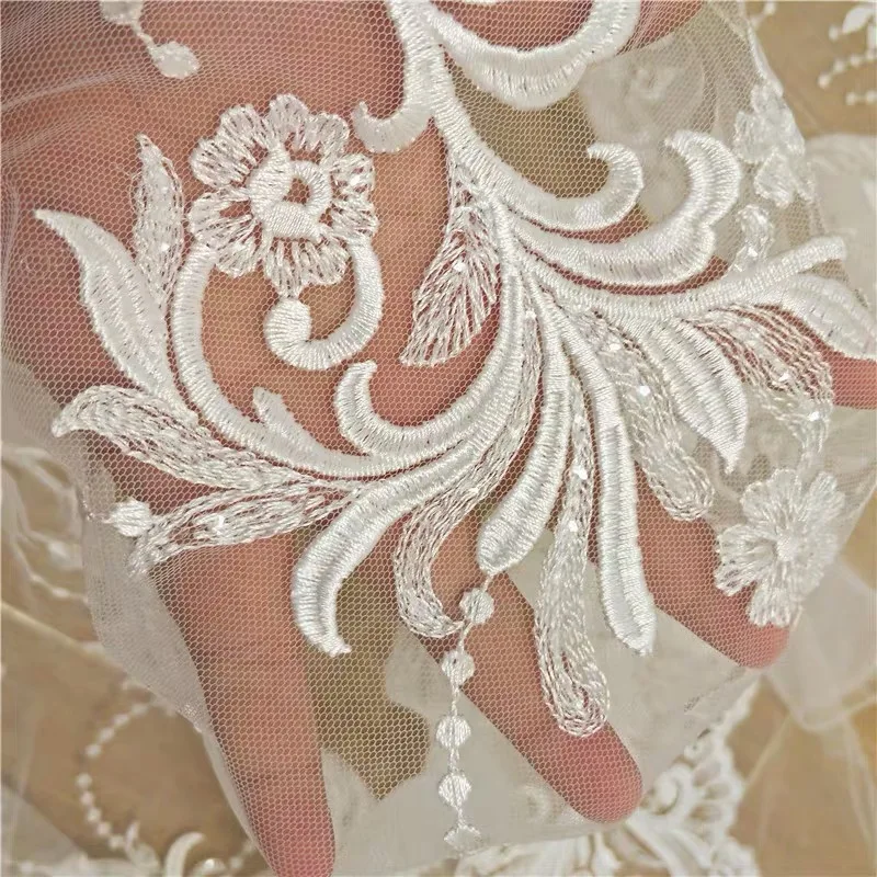 2020 New arrival seuqins lace fabric fashion wedding dress lace fabric 130cm width ivory lace sell by yard