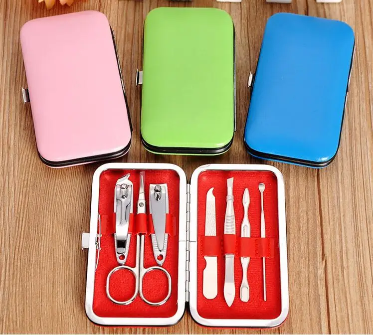 7pcs Nail Clippers Kit Scissors Tweezer Knife Ear pick Utility Manicure Set Tools Gifts Random Colors SN2332