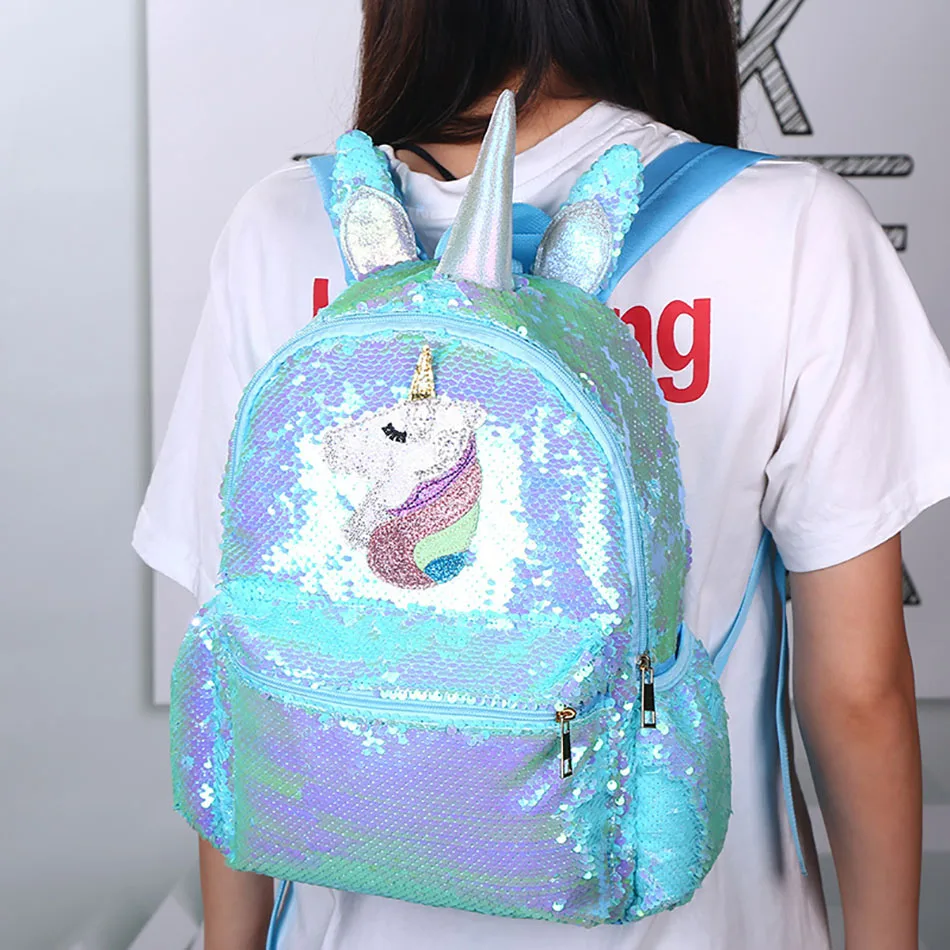 Moda kız Sequins Unicorn sırt çantaları çocuklar için PVC Mermaid parlak ışık okul çantaları kız ve erkek karikatür omuz çantası