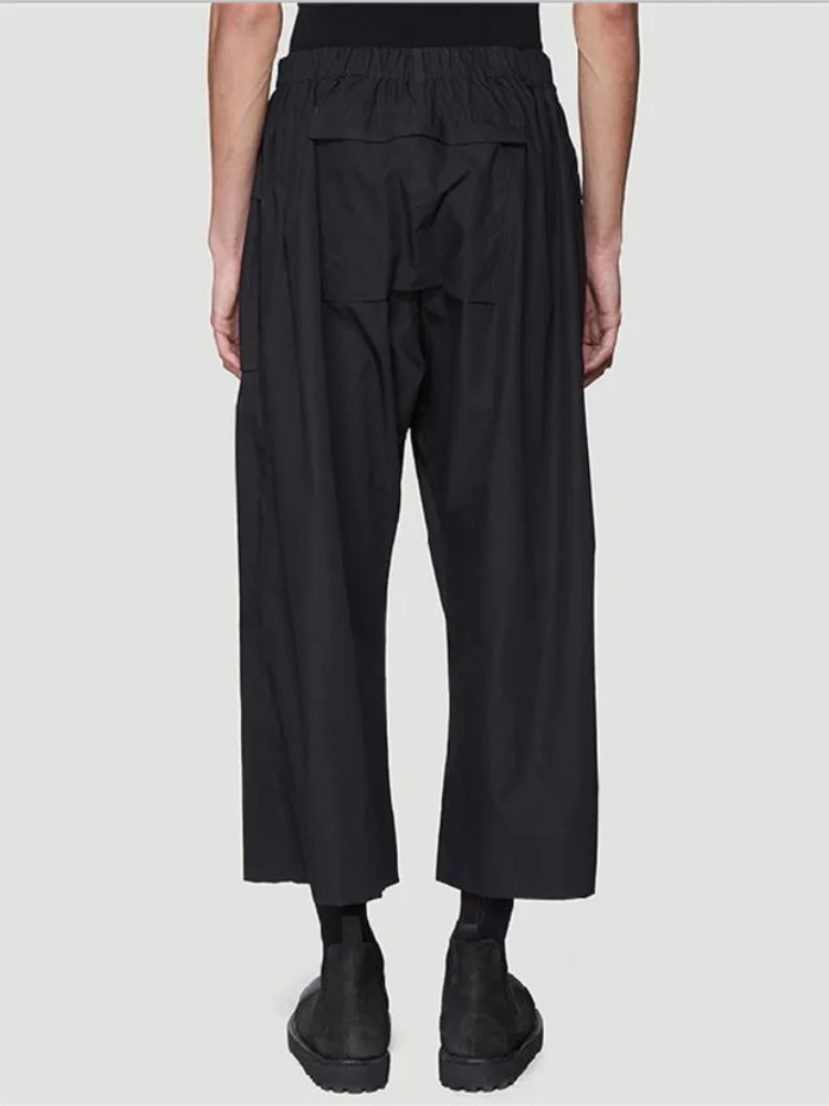 De nieuwe zomer herenmode rechte broek in pure kleur, bijpassende casual losse wijde pijpen broek met grote zak butt plakken