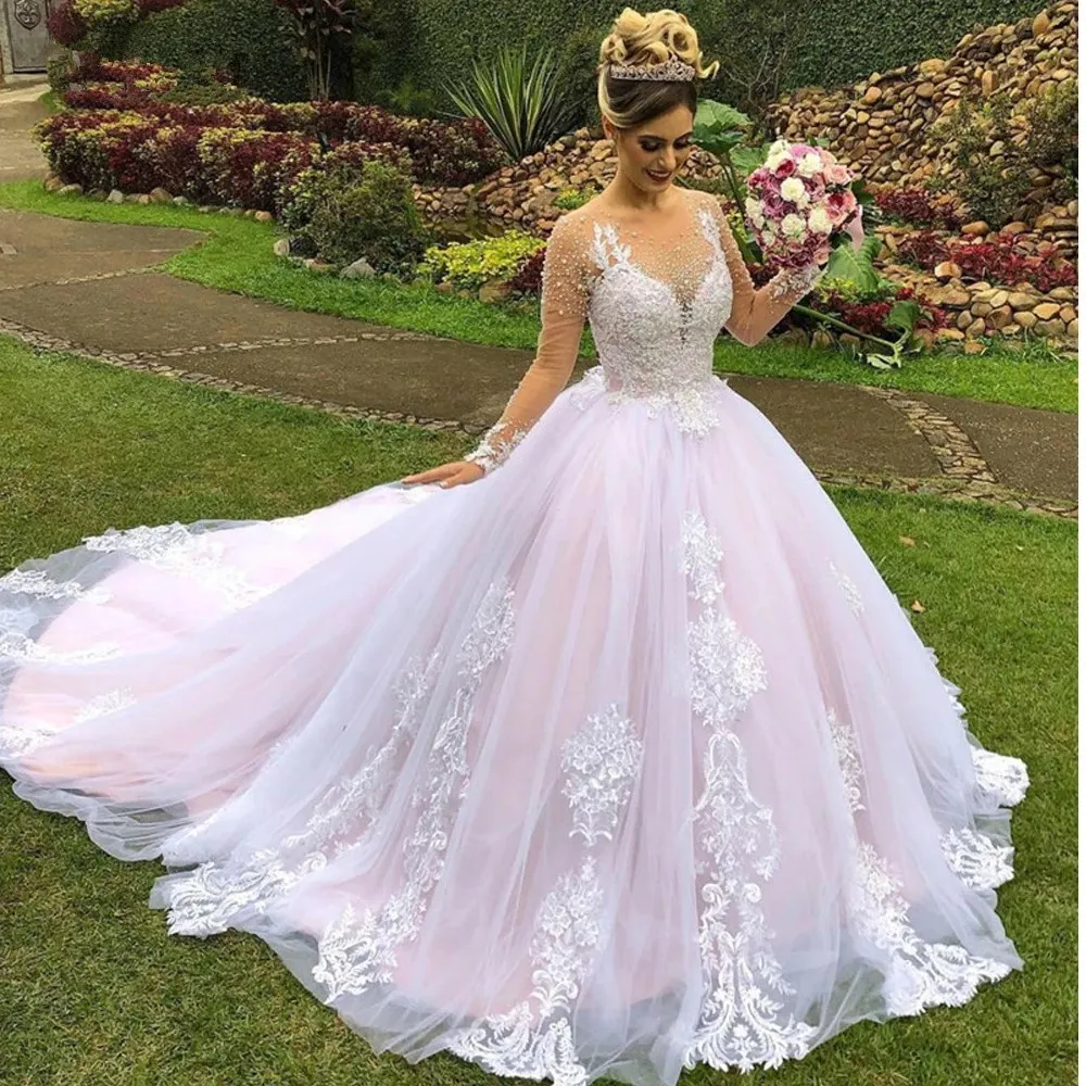 Princess Pink Wedding Dresses 2023 robe de mariage Lace Applique Pearls Sheer Neck Long Sleeves Garden Bridal Gowns