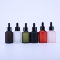 cosmetic packaging custom 60cc essential oil bottle 60ml matte black slant shoulder glass dropper bottle